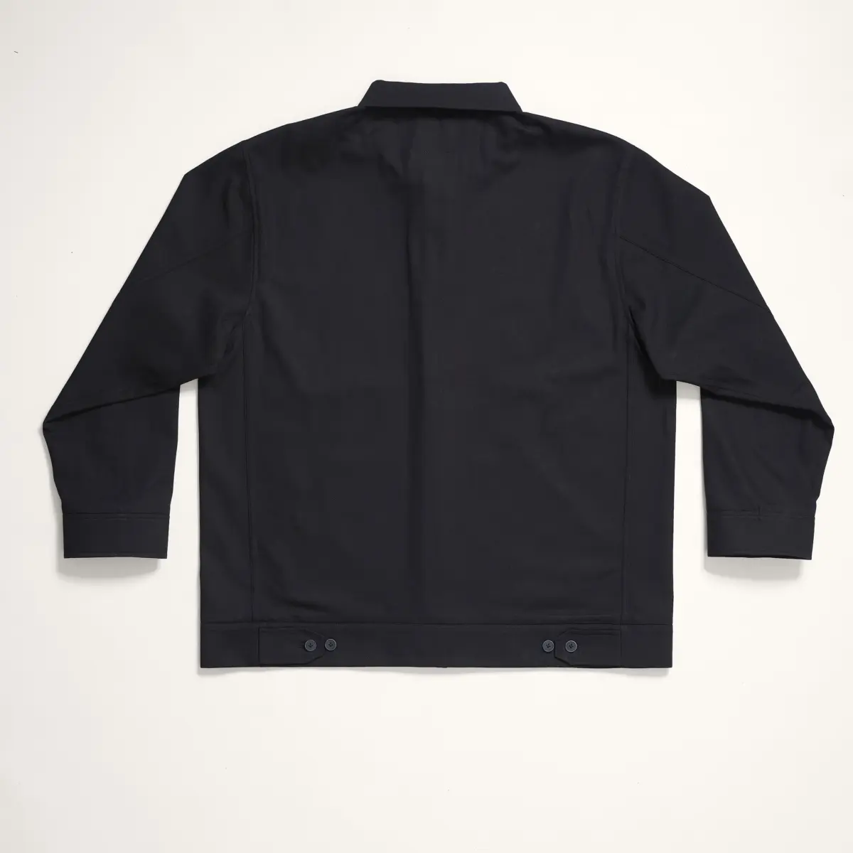 Jacke in Schwarz, flach ausgelegt von hinten