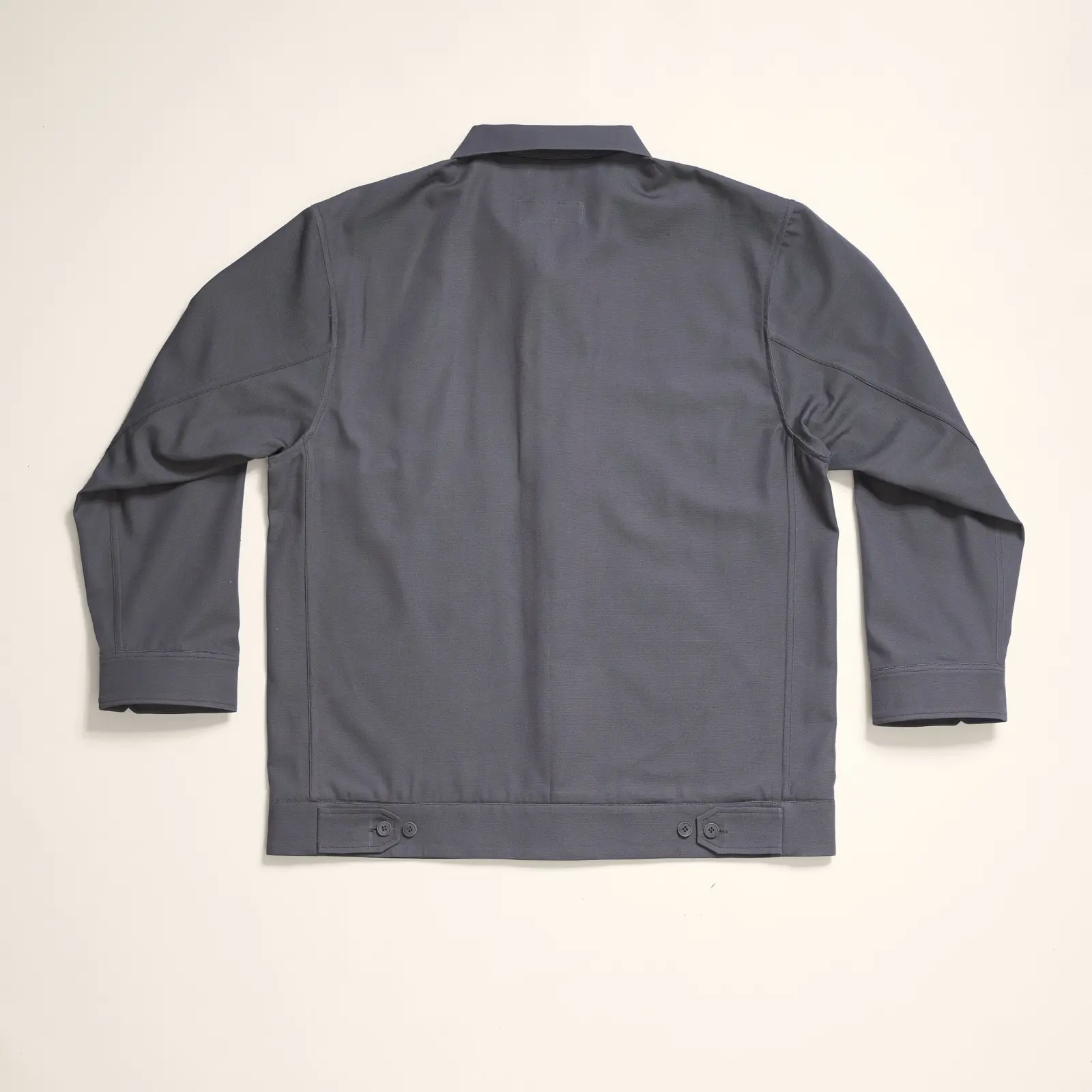 Jacke in Grau, flach ausgelegt von hinten